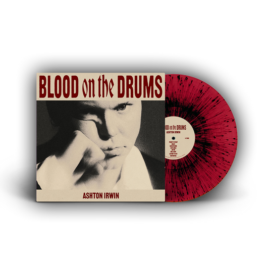 A vinyl record labeled 'BLOOD on the DRUMS' by Ashton Irwin with a red and black speckled pattern.