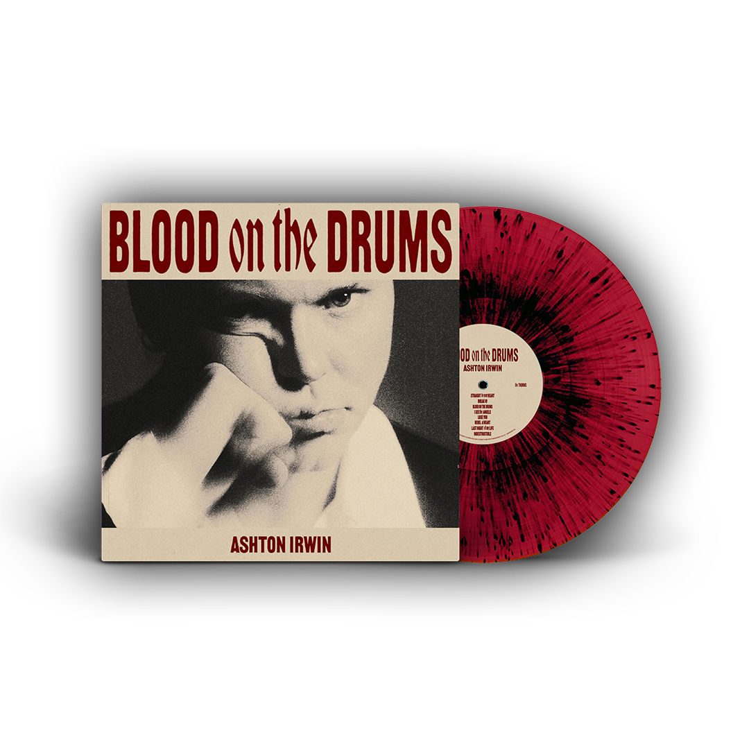 A vinyl record labeled 'BLOOD on the DRUMS' by Ashton Irwin with a red and black speckled pattern.